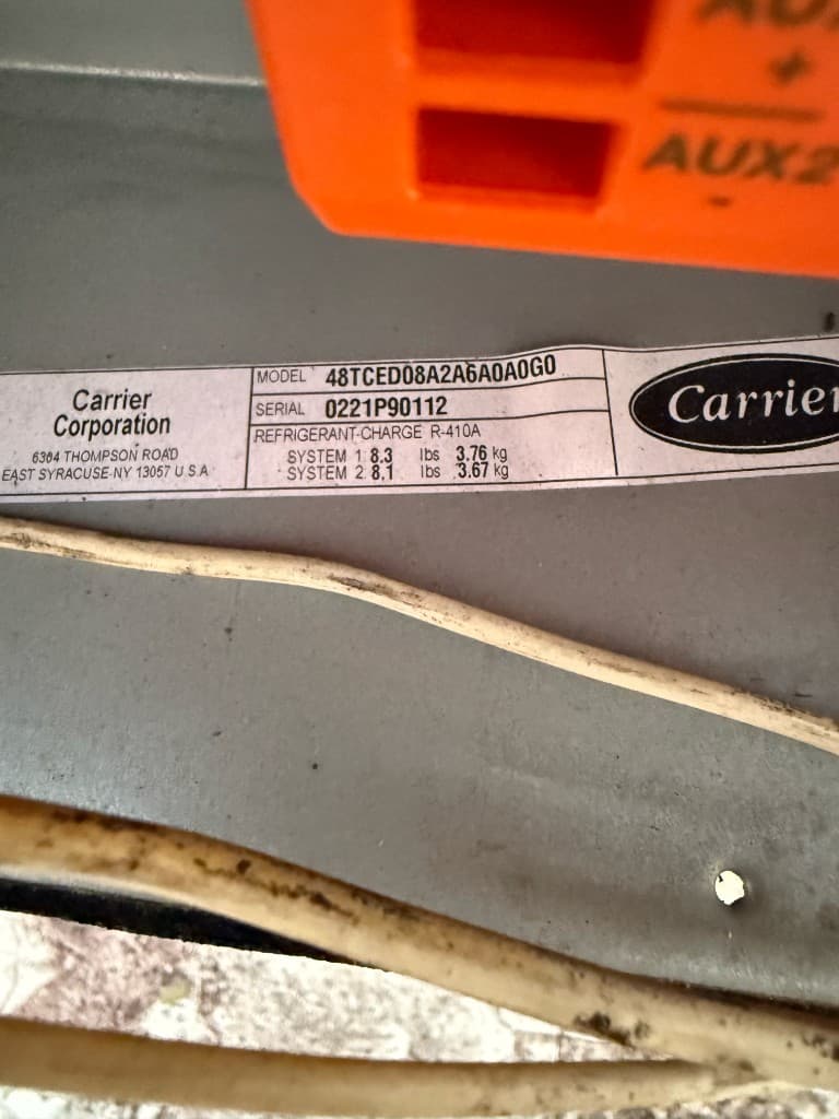 Rooftop HVAC — pipes, conduits, and wiring