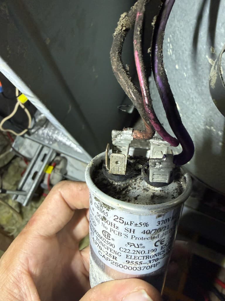 Capacitor replacement — residential air handler / attic service